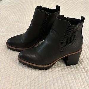 Lug sole heeled boot